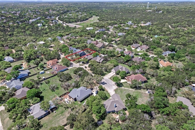 7 Harmony Ln, Wimberley, TX 78676 - aerial view of property and surrounding area with nearby suburban area