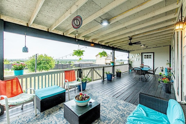 171 Milagros Dr, Cedar Creek, TX 78612 - deck featuring a fenced backyard, ceiling fan, and outdoor dining space