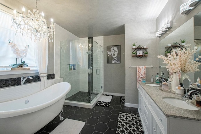 171 Milagros Dr, Cedar Creek, TX 78612 - bathroom with a stall shower, a soaking tub, double vanity, a chandelier, and tile patterned flooring
