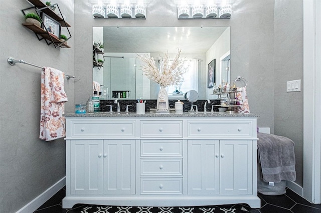 171 Milagros Dr, Cedar Creek, TX 78612 - full bath featuring double vanity and tile patterned floors