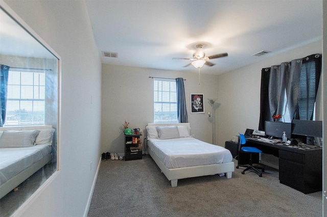 171 Milagros Dr, Cedar Creek, TX 78612 - carpeted bedroom with an office area and ceiling fan