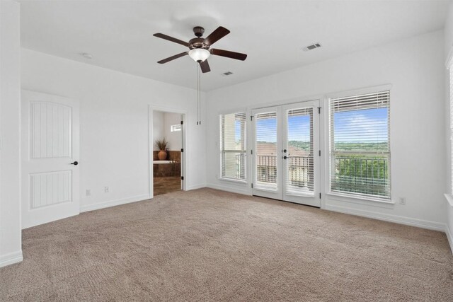 111 Antonio Way Unit 5A, Austin, TX 78734 - spare room featuring carpet and a ceiling fan