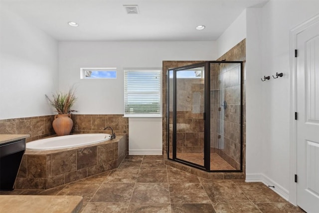 111 Antonio Way Unit 5A, Austin, TX 78734 - bathroom featuring a bath, a stall shower, vanity, and recessed lighting