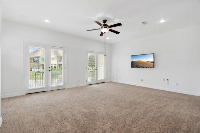 111 Antonio Way Unit 5A, Austin, TX 78734 - unfurnished living room featuring ceiling fan, light carpet, and recessed lighting