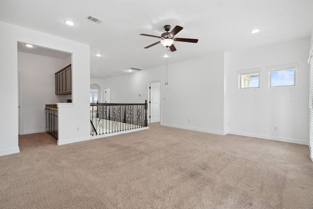 111 Antonio Way Unit 5A, Austin, TX 78734 - spare room featuring ceiling fan, light colored carpet, and recessed lighting