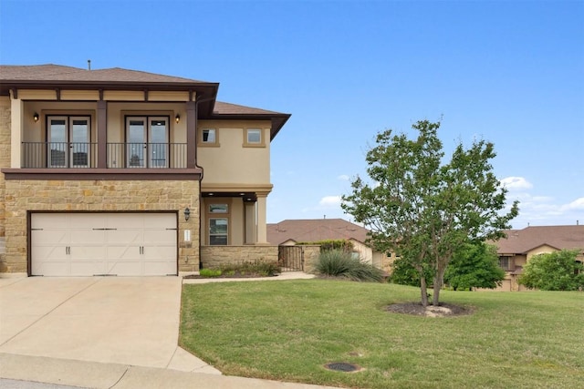111 Antonio Way Unit 5A, Austin, TX 78734 - view of front of property featuring stone siding, french doors, driveway, an attached garage, and a front lawn