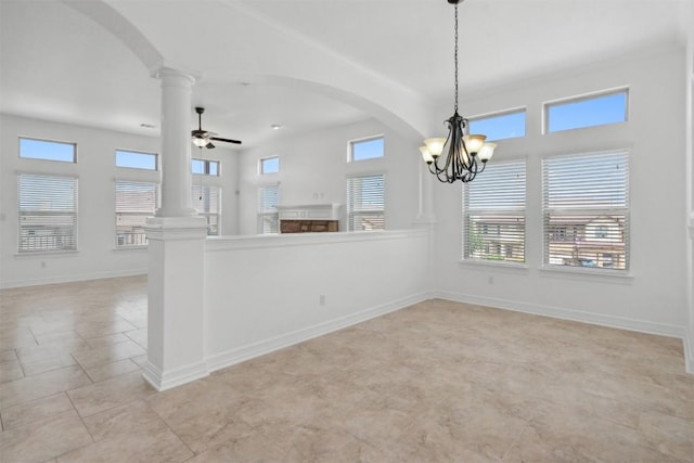 111 Antonio Way Unit 5A, Austin, TX 78734 - unfurnished dining area featuring plenty of natural light, arched walkways, and ornate columns