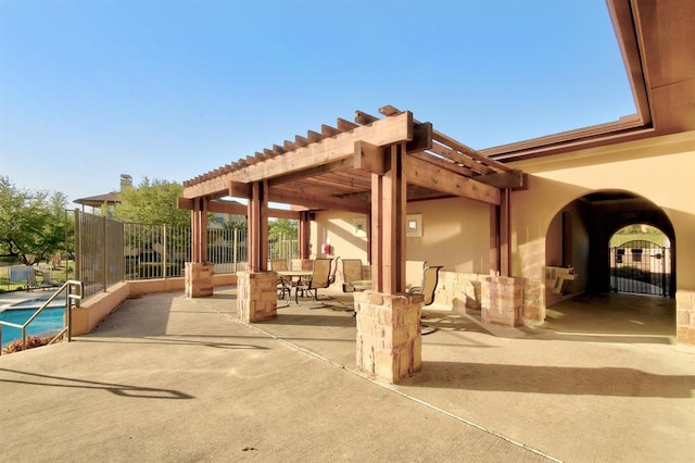 111 Antonio Way Unit 5A, Austin, TX 78734 - view of patio / terrace with outdoor dining area and a pergola