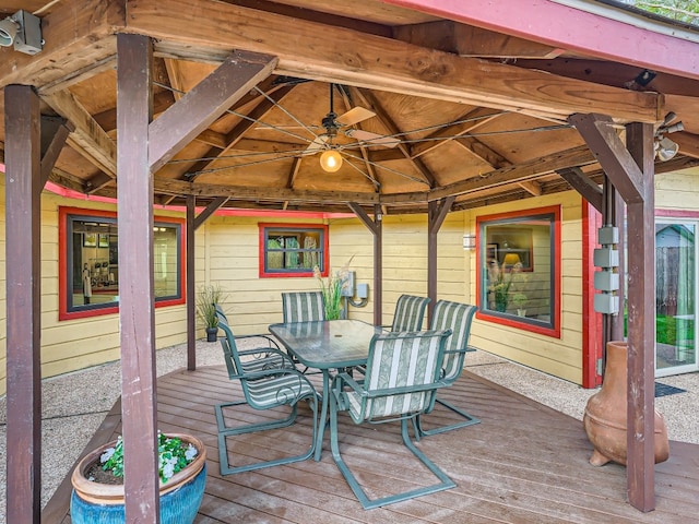 822 Hermitage Dr, Austin, TX 78753 - wooden terrace featuring a gazebo, outdoor dining area, and a ceiling fan