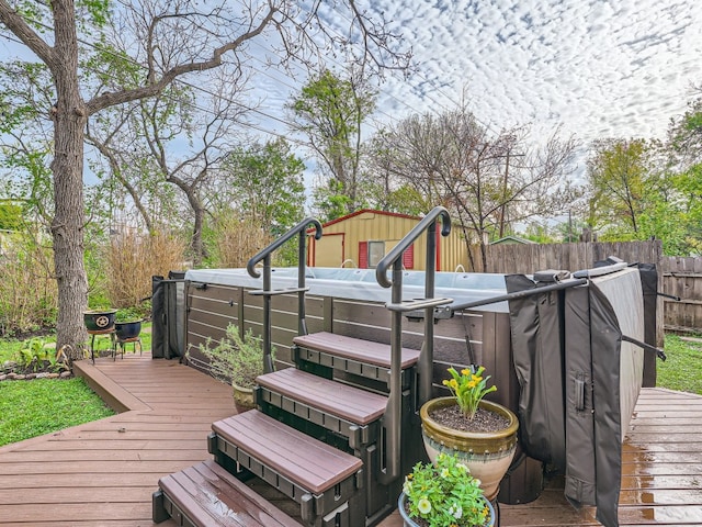 822 Hermitage Dr, Austin, TX 78753 - deck featuring a jacuzzi and a fenced backyard