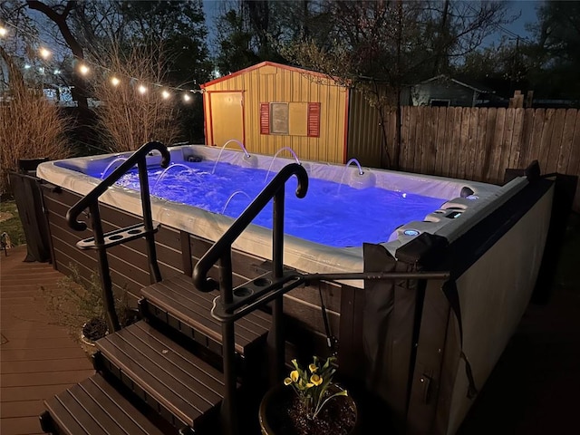 822 Hermitage Dr, Austin, TX 78753 - view of pool featuring a hot tub, fence, and a wooden deck
