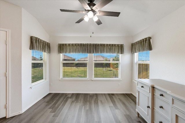 102 Reagor Dr, Taylor, TX 76574 - unfurnished dining area with wood finished floors, plenty of natural light, and ceiling fan