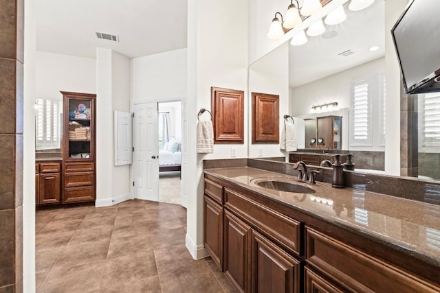 16216 Zagros Way, Austin, TX 78738 - ensuite bathroom with vanity and tile patterned flooring