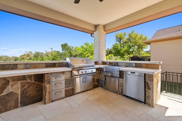 16216 Zagros Way, Austin, TX 78738 - view of patio / terrace with exterior kitchen and a ceiling fan