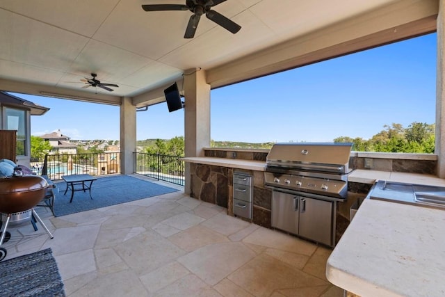16216 Zagros Way, Austin, TX 78738 - view of patio featuring an outdoor kitchen and a ceiling fan