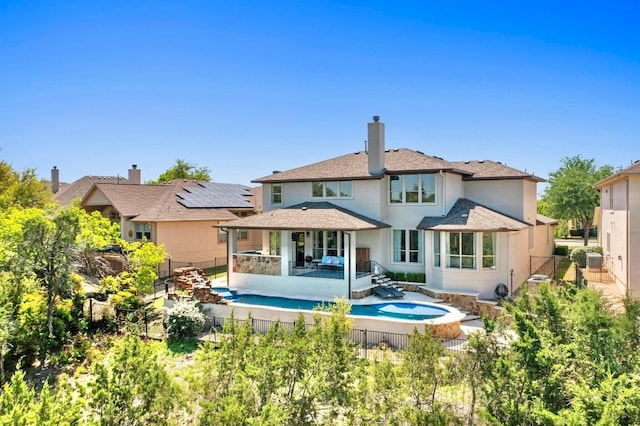 16216 Zagros Way, Austin, TX 78738 - rear view of property with stucco siding, a fenced backyard, a chimney, and a patio