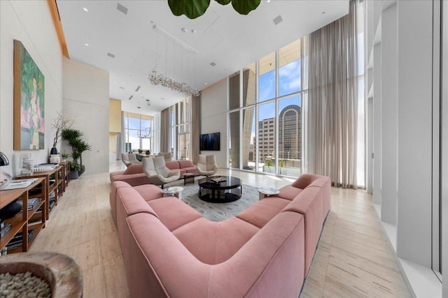 313 W 17th St Unit 2406, Austin, TX 78701 - living room with floor to ceiling windows and a towering ceiling