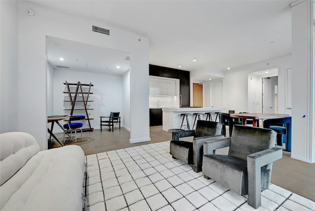 313 W 17th St Unit 2406, Austin, TX 78701 - living area with baseboards, light wood-type flooring, recessed lighting, and visible vents