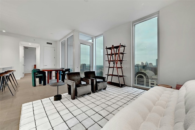 313 W 17th St Unit 2406, Austin, TX 78701 - living area featuring visible vents, recessed lighting, and a wall of windows