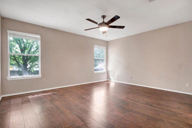 1415 Quicksilver Cir, Round Rock, TX 78665 - unfurnished room with ceiling fan and dark wood-style flooring