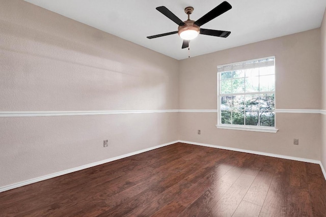 1415 Quicksilver Cir, Round Rock, TX 78665 - spare room with wood finished floors and a ceiling fan
