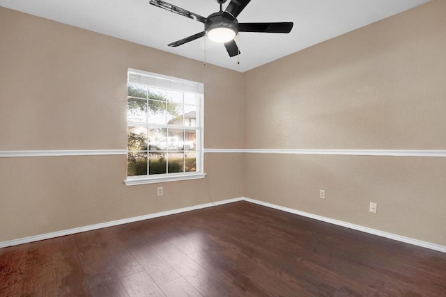 1415 Quicksilver Cir, Round Rock, TX 78665 - empty room with baseboards, a ceiling fan, and wood finished floors