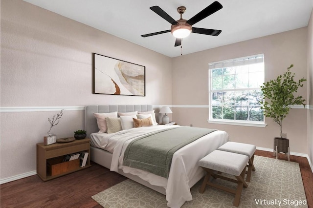 1415 Quicksilver Cir, Round Rock, TX 78665 - bedroom with wood finished floors, baseboards, and a ceiling fan