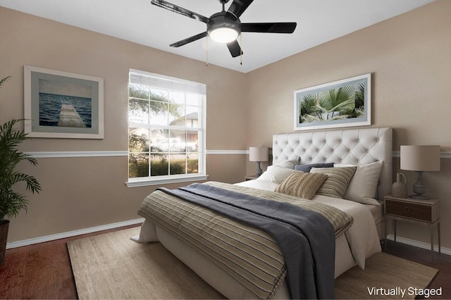 1415 Quicksilver Cir, Round Rock, TX 78665 - bedroom featuring wood finished floors, baseboards, and a ceiling fan
