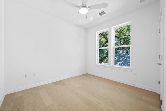 5107 Menchaca Rd Unit 9, Austin, TX 78745 - unfurnished room with light wood finished floors and a ceiling fan