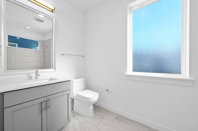5107 Menchaca Rd Unit 9, Austin, TX 78745 - full bath featuring tiled shower, vanity, and marble finish floors