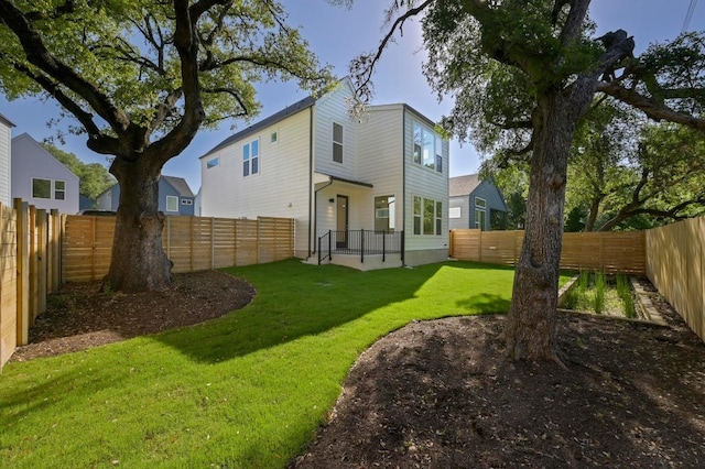 5107 Menchaca Rd Unit 9, Austin, TX 78745 - back of house with a fenced backyard