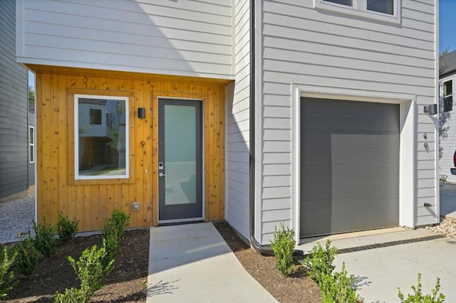 5107 Menchaca Rd Unit 9, Austin, TX 78745 - view of exterior entry with a garage