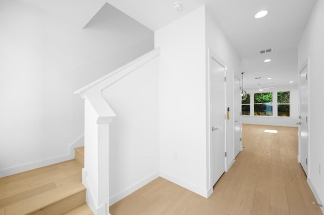 5107 Menchaca Rd Unit 9, Austin, TX 78745 - hallway featuring light wood-style flooring, recessed lighting, and stairway