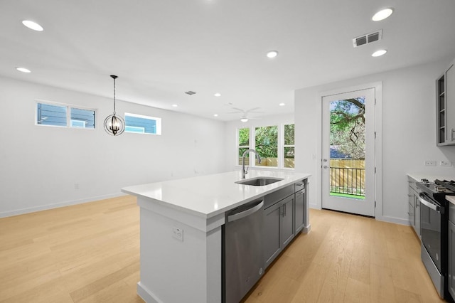 5107 Menchaca Rd Unit 9, Austin, TX 78745 - kitchen featuring dishwasher, range with electric cooktop, light wood-style floors, light countertops, and recessed lighting