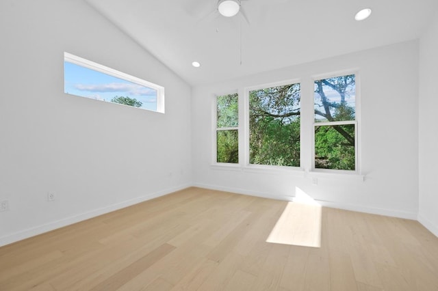 5107 Menchaca Rd Unit 9, Austin, TX 78745 - spare room with healthy amount of natural light, light wood finished floors, ceiling fan, recessed lighting, and lofted ceiling