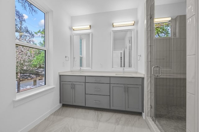 5107 Menchaca Rd Unit 9, Austin, TX 78745 - bathroom featuring double vanity, a stall shower, and marble finish flooring