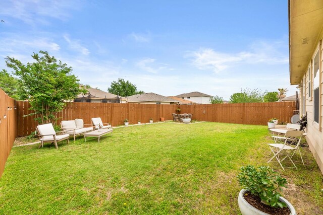 12616 Sky Harbor Dr, Del Valle, TX 78617 - view of yard with a fenced backyard