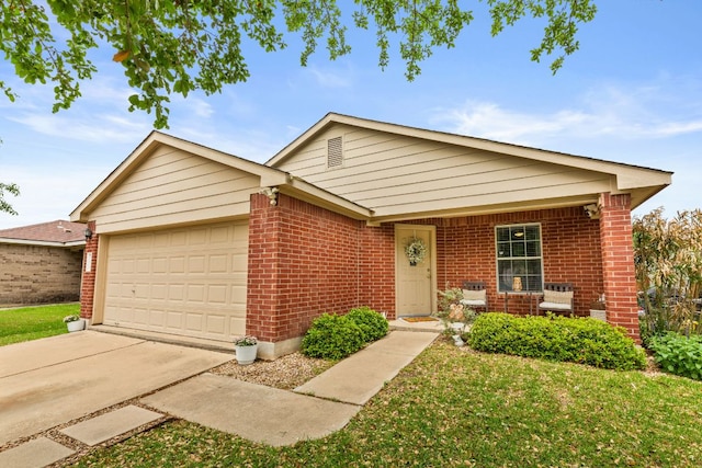 12616 Sky Harbor Dr, Del Valle, TX 78617 - ranch-style house featuring brick siding, an attached garage, a front lawn, and driveway