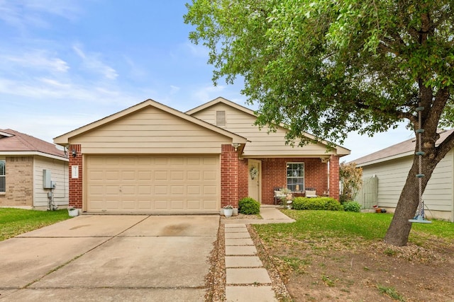 12616 Sky Harbor Dr, Del Valle, TX 78617 - ranch-style home with brick siding, an attached garage, a front yard, and concrete driveway