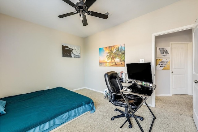 carpeted bedroom with baseboards, a ceiling fan, and visible vents