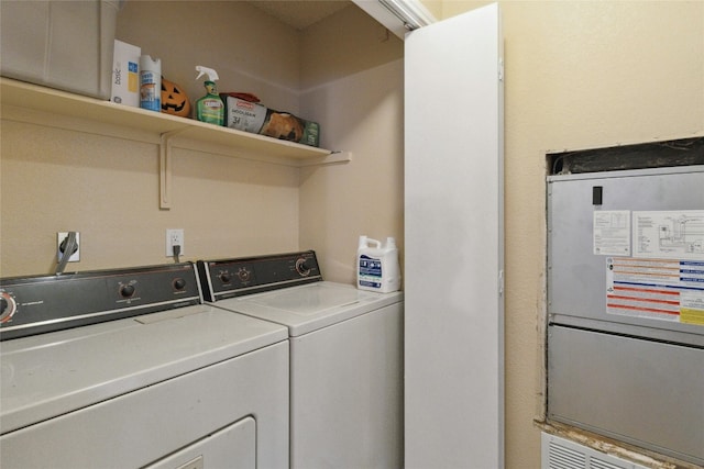 1202 Thorpe Ln Unit 211, San Marcos, TX 78666 - clothes washing area featuring laundry area and washer and dryer