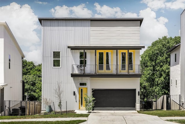 5368 Agatha Cir, Austin, TX 78724 - contemporary home featuring a balcony, a garage, and concrete driveway
