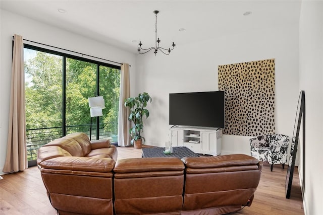 5368 Agatha Cir, Austin, TX 78724 - living area featuring a chandelier, wood finished floors, and recessed lighting