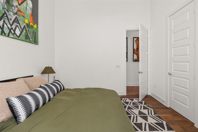 5368 Agatha Cir, Austin, TX 78724 - bedroom featuring dark wood finished floors and baseboards
