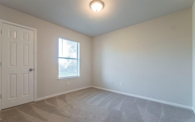 208 Bastian Ln, Georgetown, TX 78626 - carpeted empty room featuring baseboards