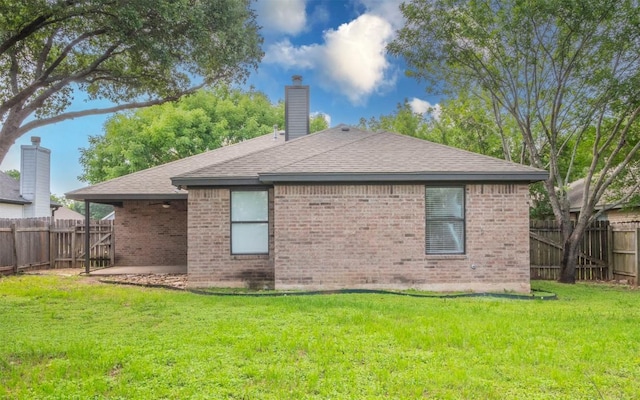 208 Bastian Ln, Georgetown, TX 78626 - rear view of house featuring brick siding, a chimney, and roof with shingles