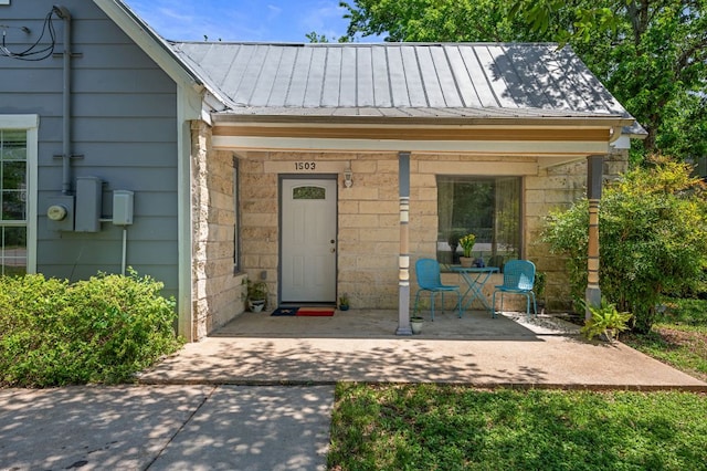 1503 Hart St, Georgetown, TX 78626 - doorway to property featuring metal roof and a standing seam roof