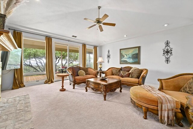 3225 Eisenhower Ave, Lago Vista, TX 78645 - carpeted living room featuring ceiling fan, recessed lighting, and crown molding
