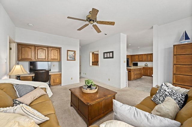 3225 Eisenhower Ave, Lago Vista, TX 78645 - living room featuring light colored carpet, ceiling fan, and baseboards