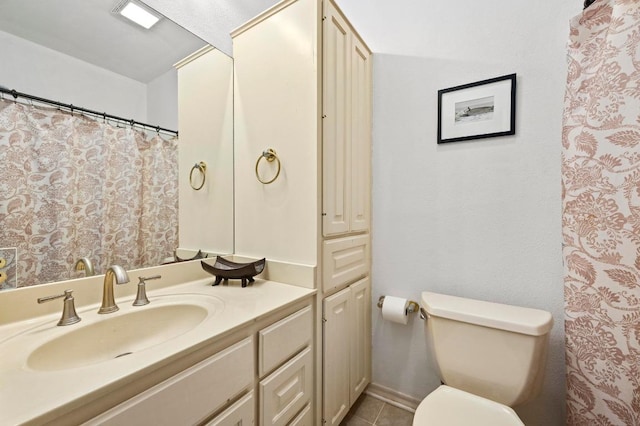 3225 Eisenhower Ave, Lago Vista, TX 78645 - full bath featuring vanity, toilet, and tile patterned floors